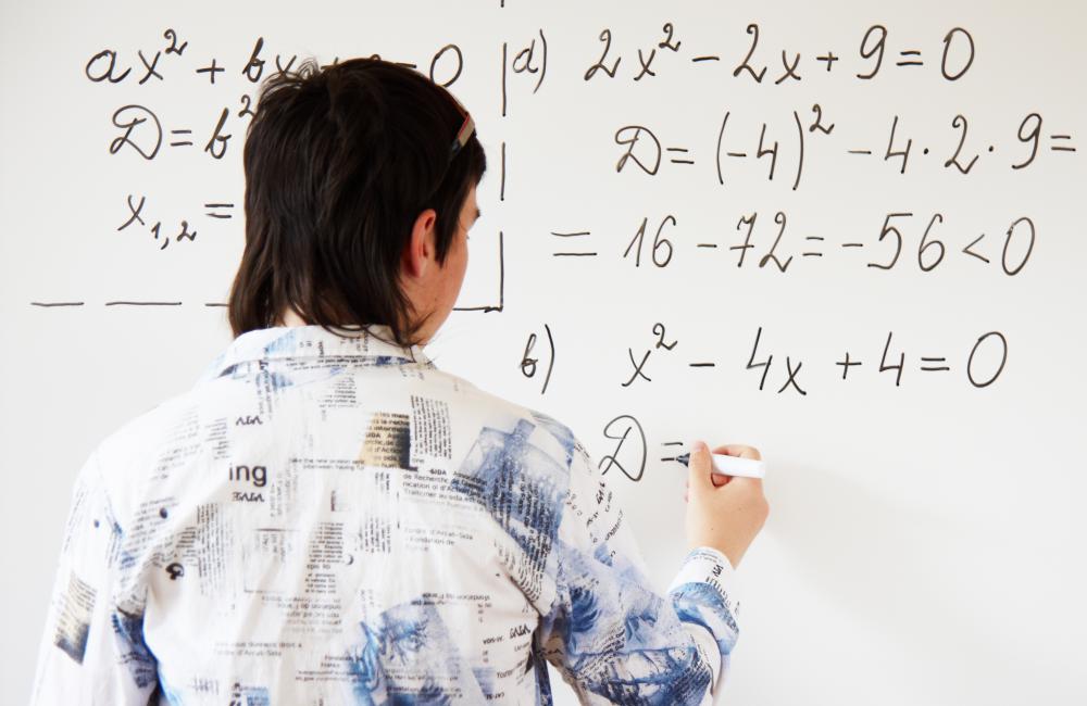 Problems featuring quadratic equations may be included on an achievement test.