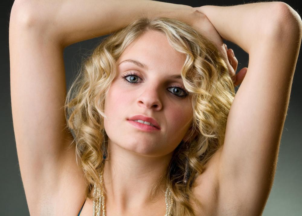 A social media specialist may work with a model to increase their web presence.