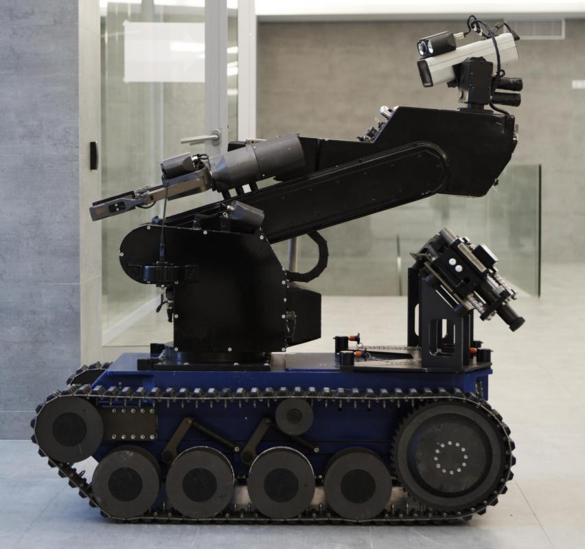 A robotics technician may specialize in designing or upgrading robots that are used to defuse bombs or carry weapons for police and military forces.