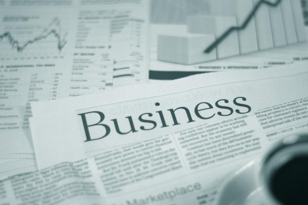 An investment banker needs to keep abreast of financial news.