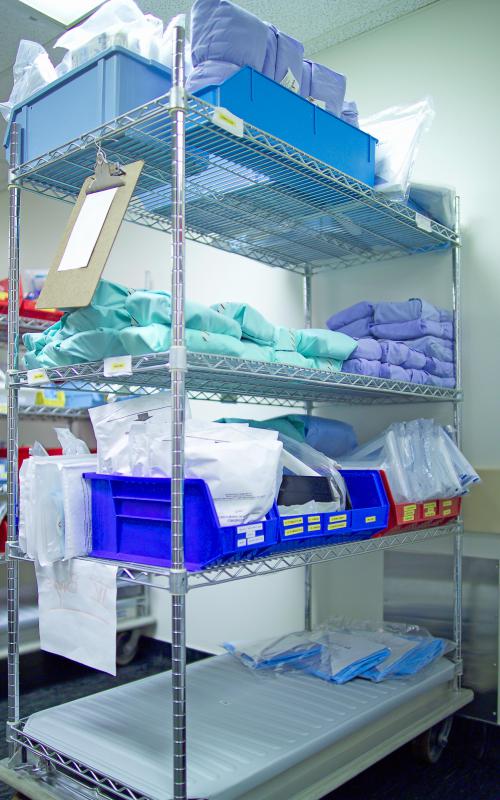 In hospitals without a critical care technicians, carts are restocked by a central supply worker.