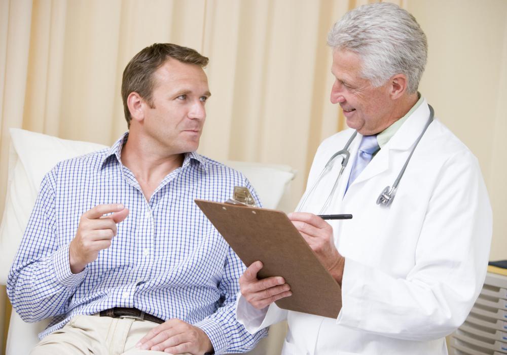 An emergency room doctor provides a diagnosis to patients.