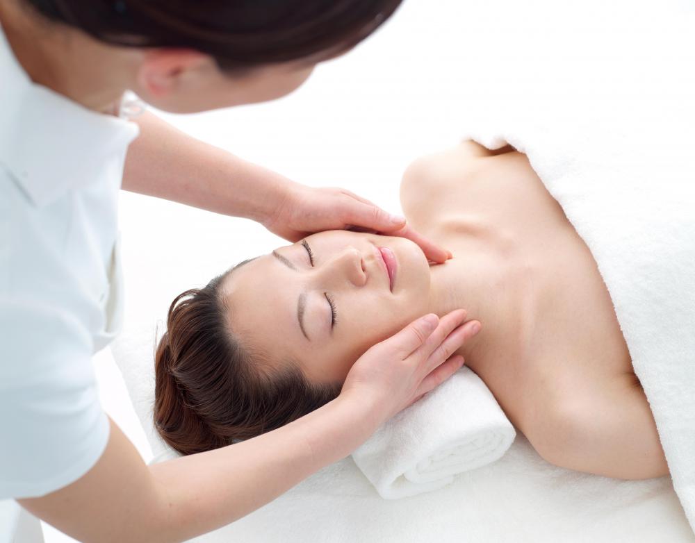 An esthetician may give facials to clients.
