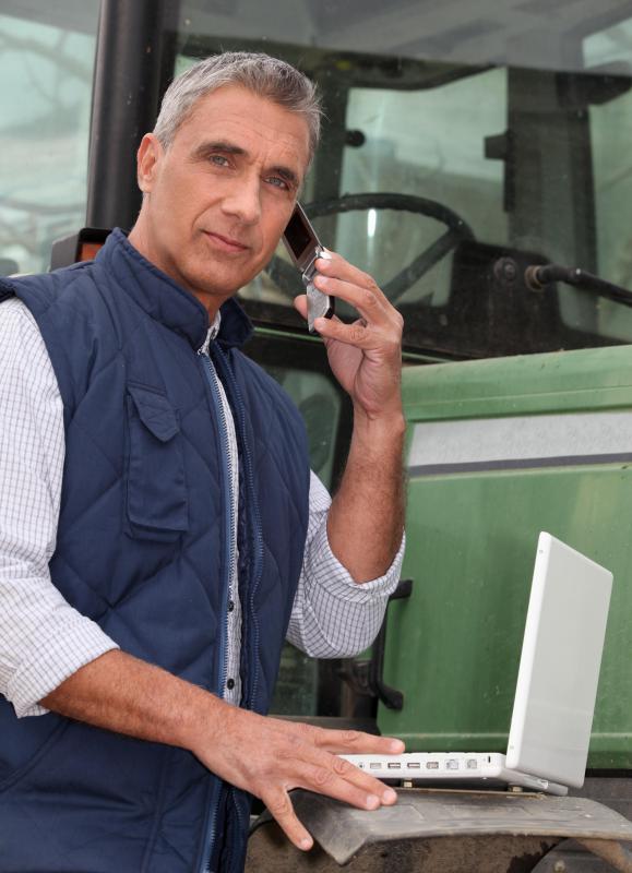 Farm management requires knowledge of modern technology to track finances and production.