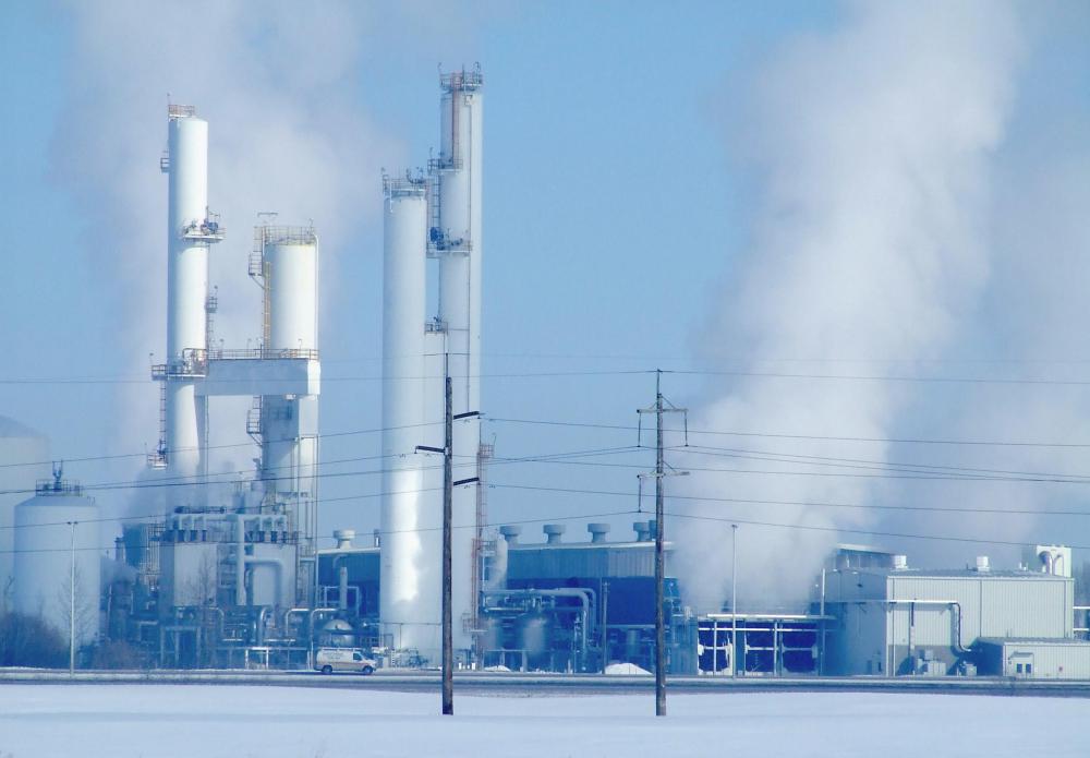 Collectively, carbon trading companies must adhere to an overall total carbon emissions limit.