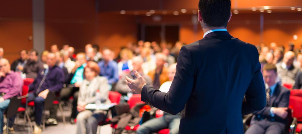 City council member candidates speak during local meetings.