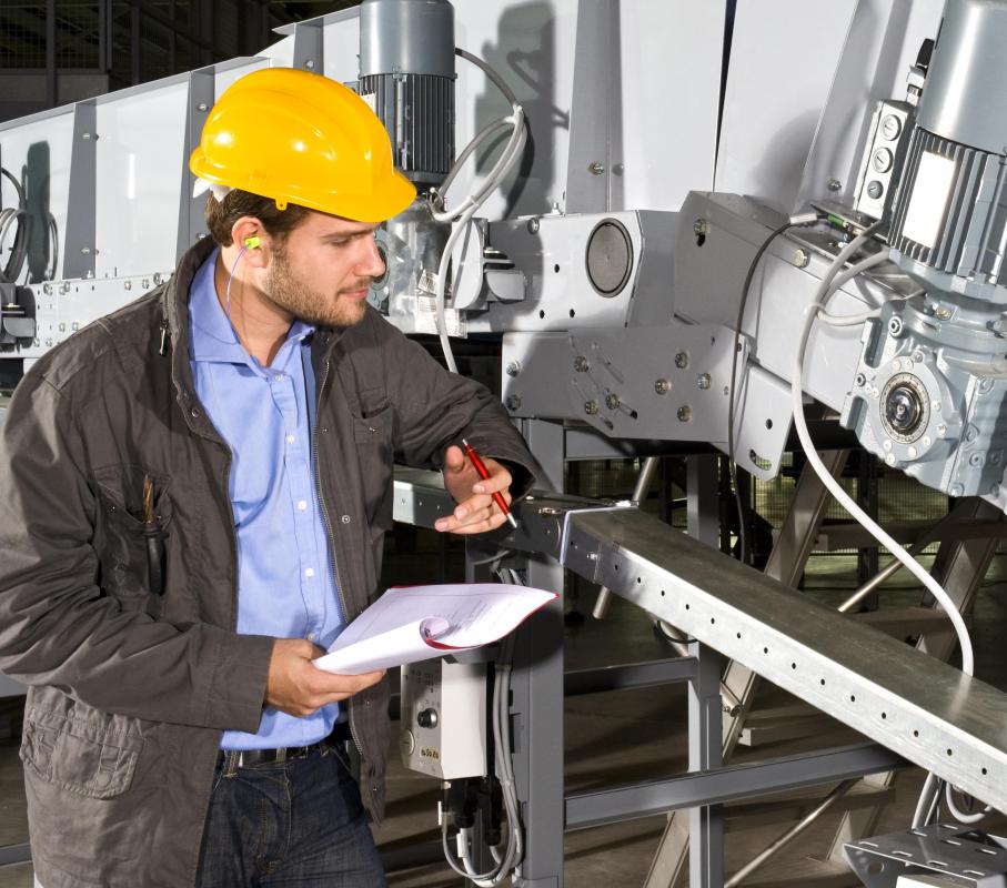 A field technician works on site, typically in a hands-on manner.
