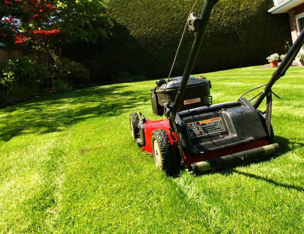 Mowing the lawn is a typical job requirement of a groundskeeper.