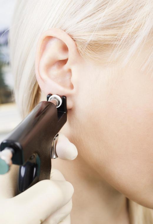 Some body artists specialize in piercings.