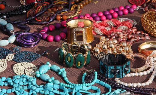 Costume designers may search for pieces of jewelry that can be added to designs.