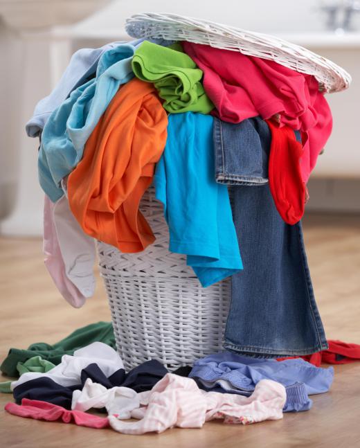A housekeeping attendant may collect dirty laundry for cleaning.
