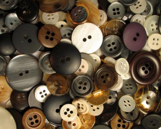 Garment manufacturers have to be able to match and sew buttons onto clothing.
