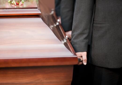A funeral director may help organize the pallbearers.