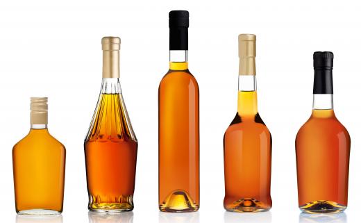 Whiskey is among drinks served by a cocktail waitress.