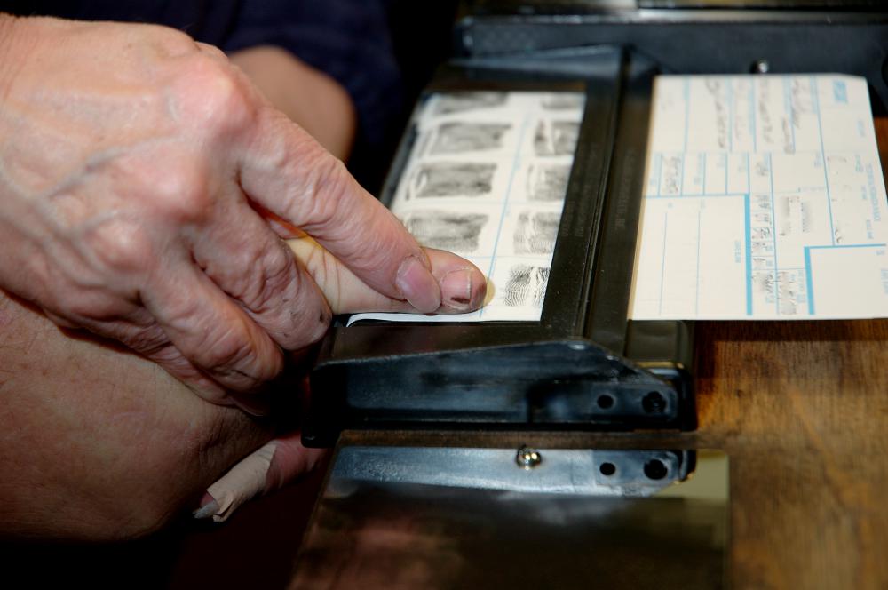Individuals obtaining an auctioneer's license may need to submit fingerprints and passport-style photos during the application process.