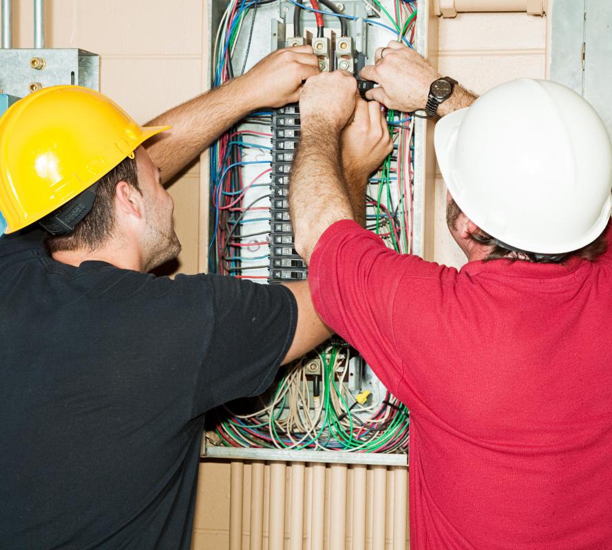 Electricians work on internal wiring in homes and other buildings.