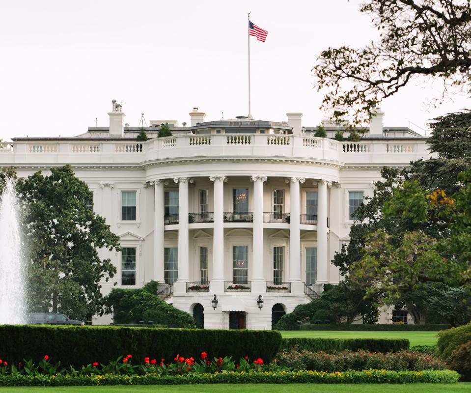 Photojournalists work at the White House, documenting the activities of the president, his family, and his staff.