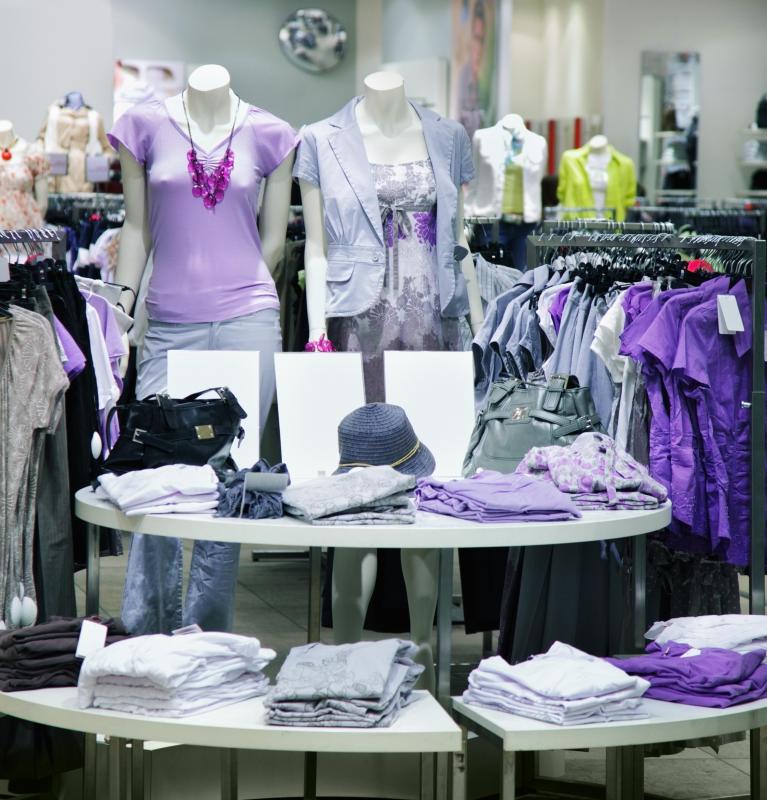 A skilled fashion stylist designs pleasing retail displays.
