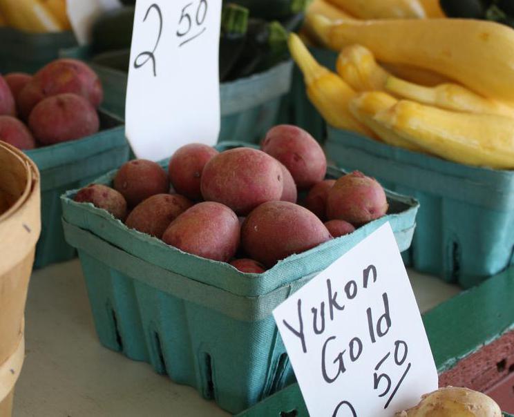 Some farmers set up stands onsite to sell their vegetables.