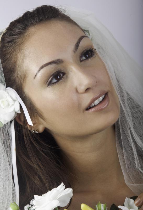 Hairstylists can help a bride get ready on her wedding day.