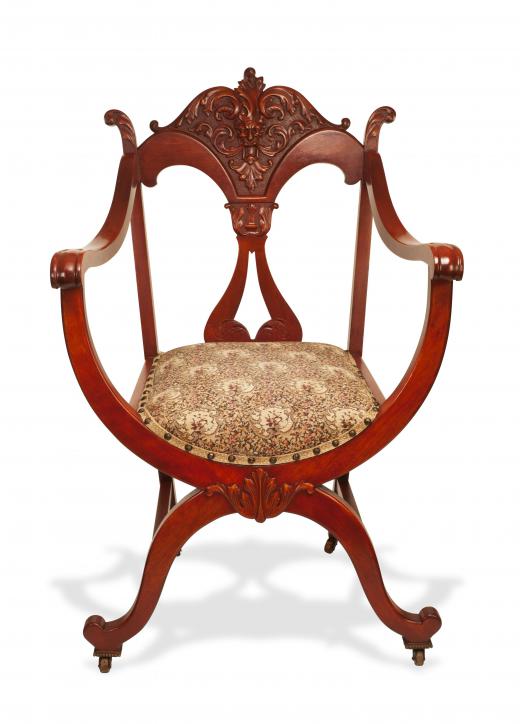 An antique restorer often specializes in the restoration of one type of object, like chairs.