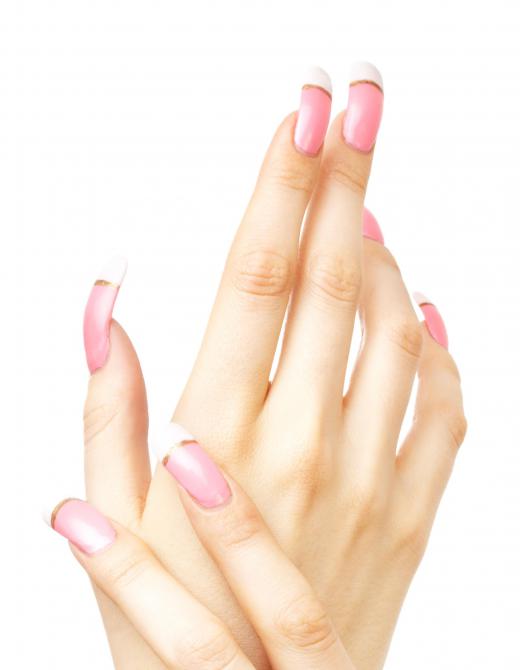 Artificial fingernails applied by a mobile nail technician.