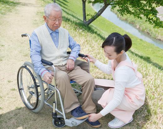 A visiting nurse may take the elderly outside for fresh air and sunshine.