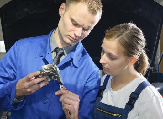 Shop foremen are often responsible for ensuring an apprentice gets the training she needs.