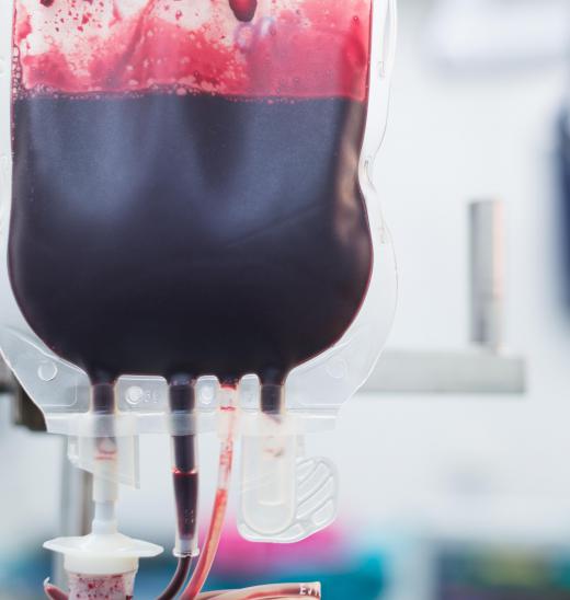 A nursing assistant may help with a blood transfusion.