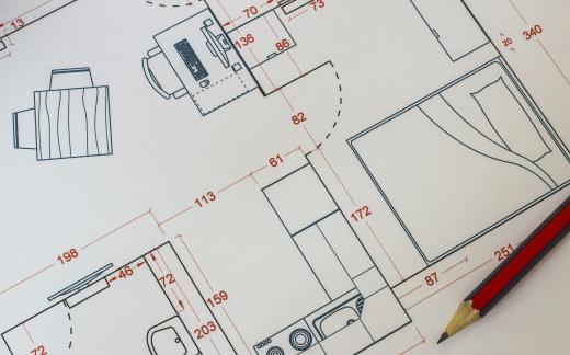 CAD operators draft plans using computer software.