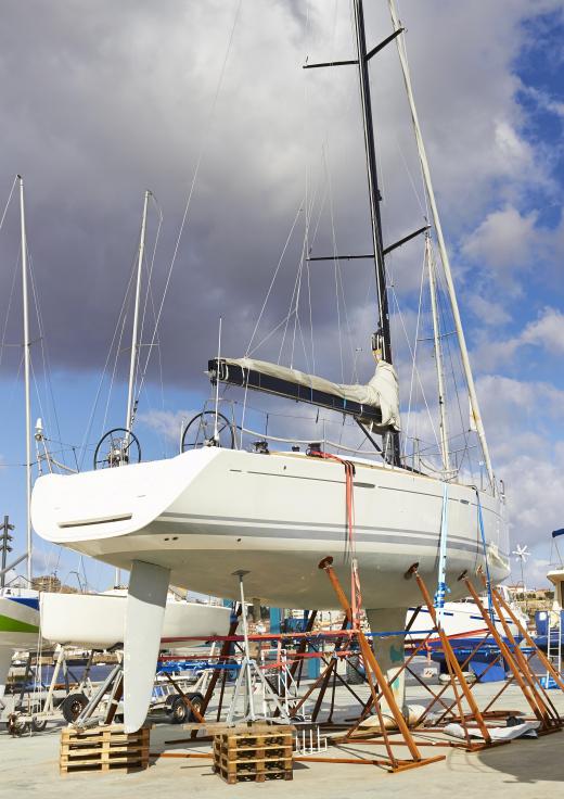 Among other things, marine surveyors inspect boat hulls for deformities.