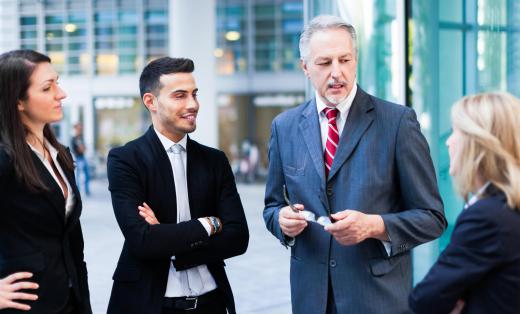 Business process specialists gather input from company employees at several levels.