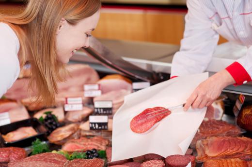 Interacting with customers is a large part of the butcher's daily routine.