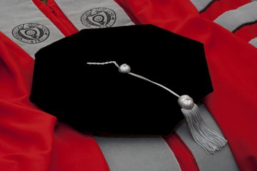 At graduation and academic ceremonies, a PhD student may wear distinctive and elaborate robes and cap.