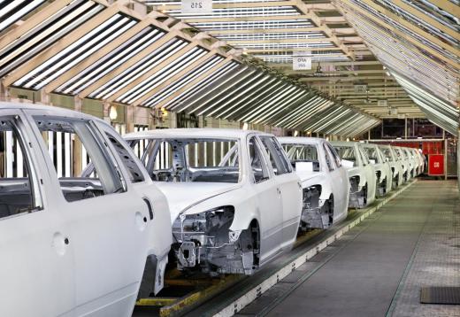 A production operator works as part of an assembly line to create products, such as cars.