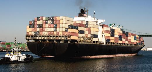 A loading master is tasked with ensuring all of the cargo is loaded aboard a ship correctly.