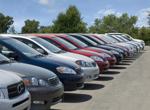 Two truck drivers may need to tow away cars that are illegally parked.