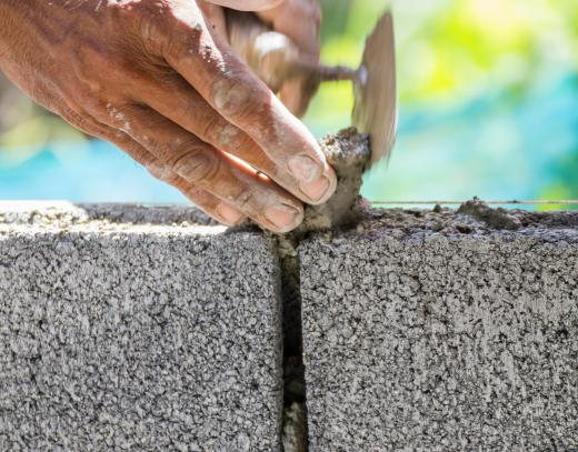 An experienced brick mason is trained to properly prepare mortar for the best results.