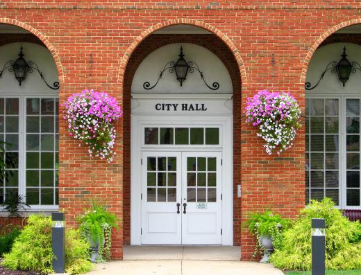 Typically, business licenses and related permits are granted at city hall.