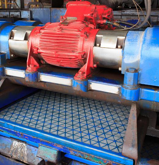 A mud engineer must ensure drilling fluids are properly cleaned and purified using machines such as a shale shaker before they can be recirculated.