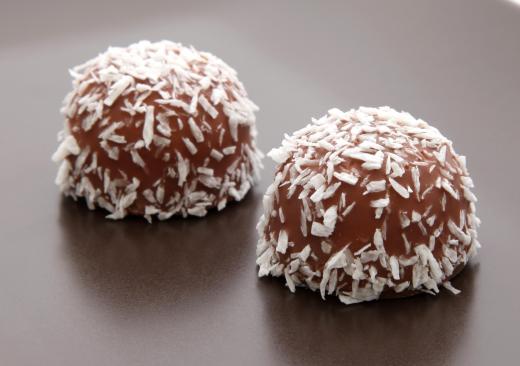 Chocolates covered in coconut flakes.