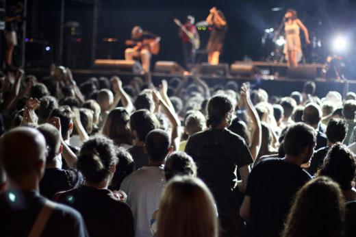 A tour manager is responsible for scheduling a band's concert performances.