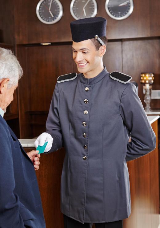 A bellboy might sometimes need a houseperson's assistance.