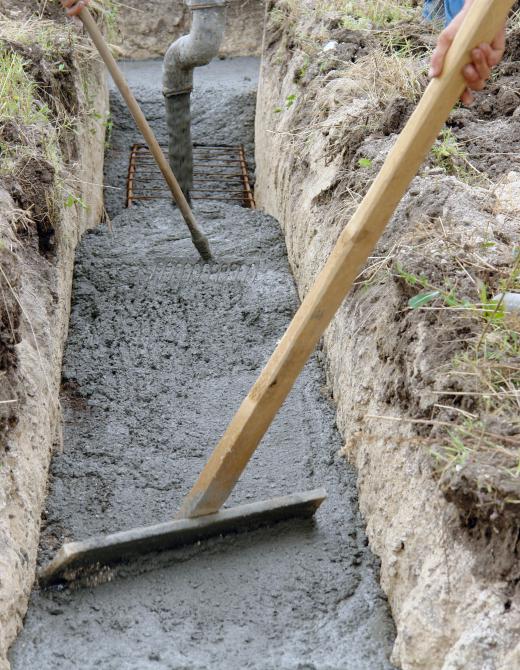 Pouring footings can be a stressful job, since the forms need to be poured quickly and in the right conditions.