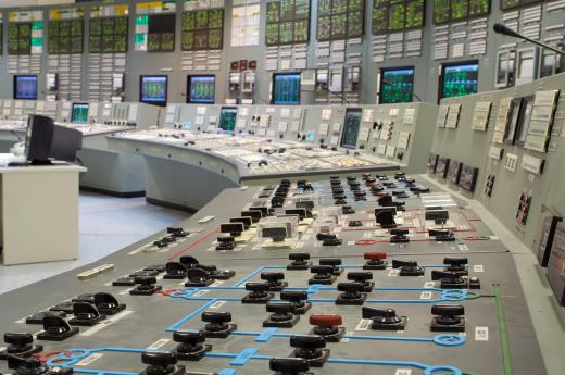 Nuclear power engineers monitor nuclear reactors from dedicated control centers.