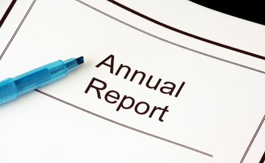 A trust officer often processes annual reports.