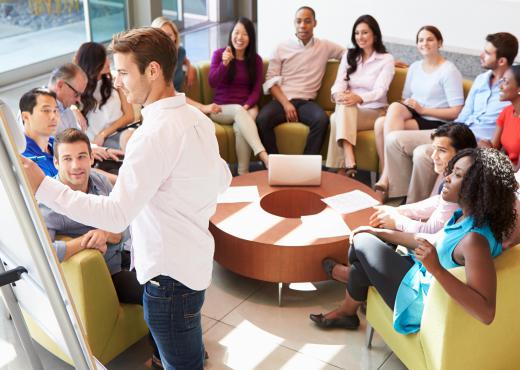 Participants may gather in groups to brainstorm new ideas.