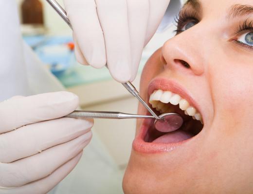 A woman having a dental exam.