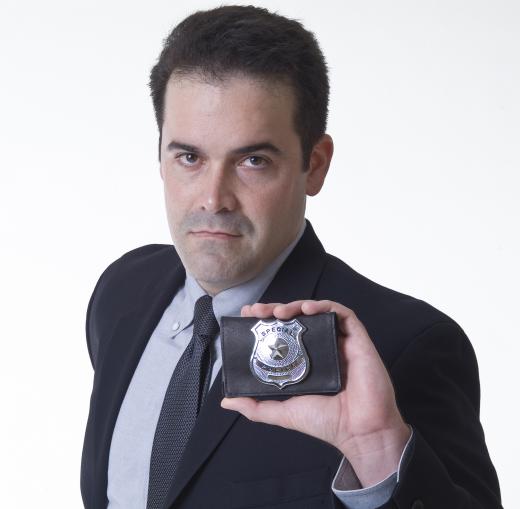 A police detective conducts criminal investigations.