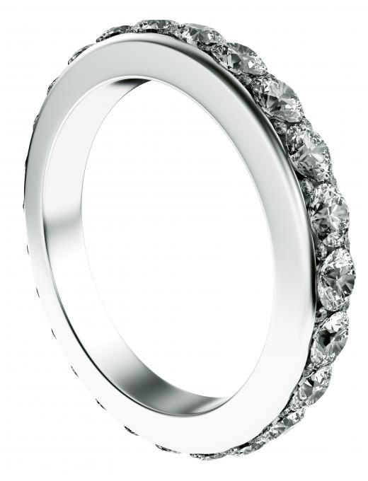 An eternity ring with a row of diamonds around the entire circumference.